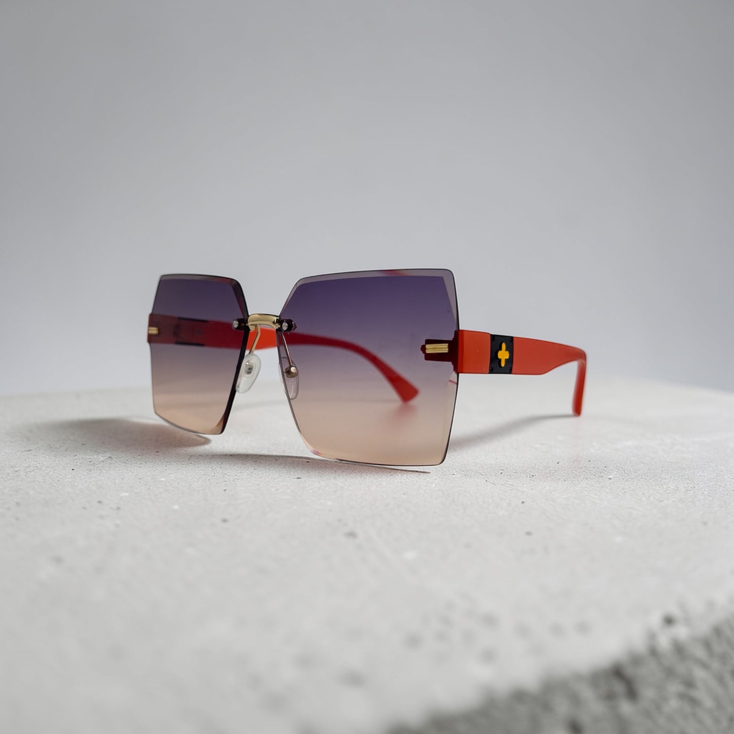 Square frameless sunglasses. Orange